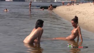 Girl woman on the nude beach with big tits, but a big body,  too.-9