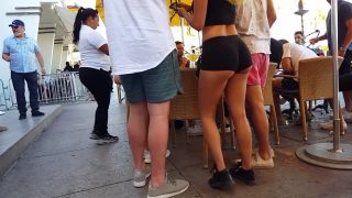 Stunning asses of girls passing flyers on  street-9