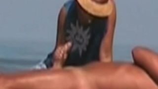 Hot lady gives a handjob at a beach-5