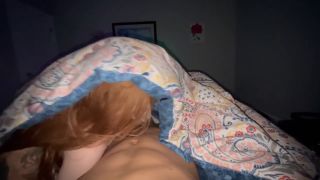 Sexy redhead girlfriend sucking dick under cover while watching TV - Amateur-6