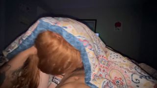 Sexy redhead girlfriend sucking dick under cover while watching TV - Amateur-8