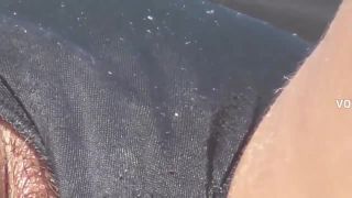 Hairy pussy slip out of thong during suntanning-0