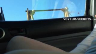 Kinky girl shows off in a moving car-0