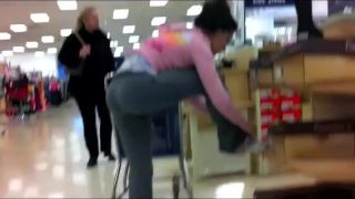 Teenage chick bends down to try  shoes-7