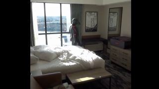 Solo Male double cocked orca jerks off and cums into used condom at hotel window-6