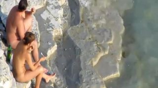 Romantic masturbation on a rocky beach-0