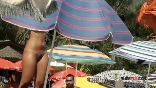 Curvy teen bares all at a naturist strand in the  sun-7
