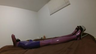 Fully encased purple latex doll-8