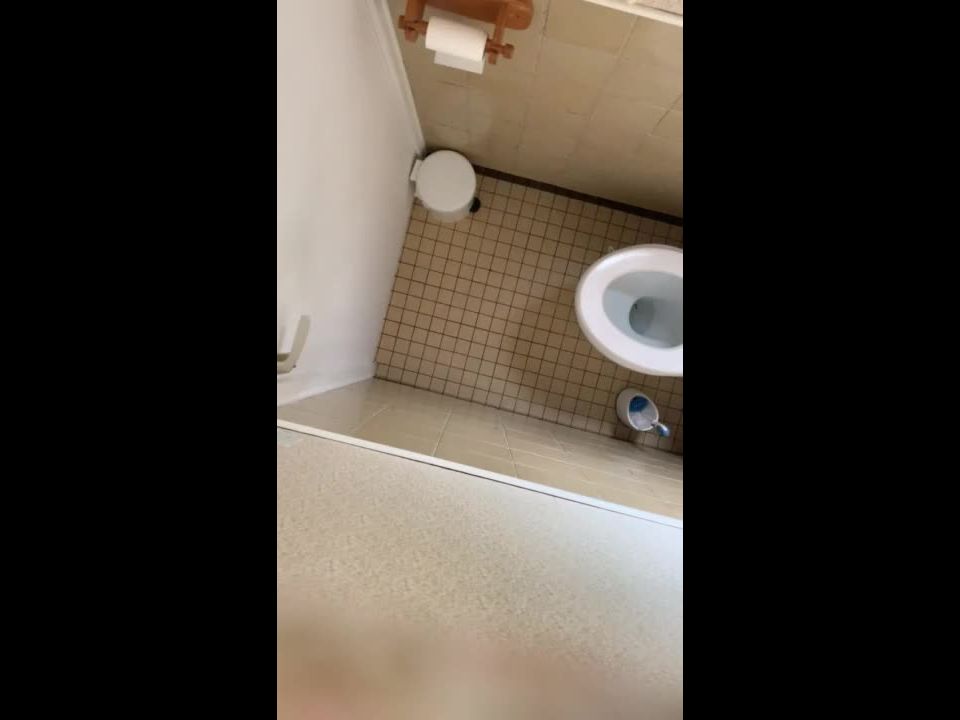 blonde glasses girl in the toilet. hidden cam