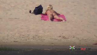 Amateur make fun at a nude beach  2-4