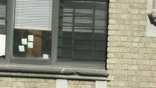 spying-across-the-street-neighbor-window_9820303_-0