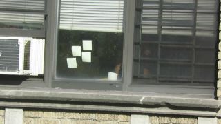 spying-across-the-street-neighbor-window_9820303_-2