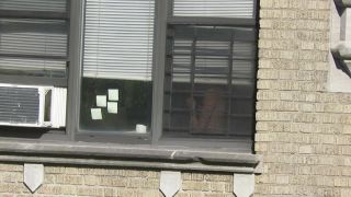 spying-across-the-street-neighbor-window_9820303_-5