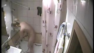 Blonde teen in the shower. hidden cam-3