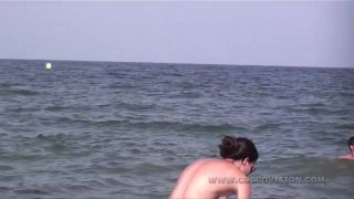 Pretty girl topless on the beach-0