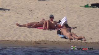 Shy teen pops her top off for all the beach goers  3-3