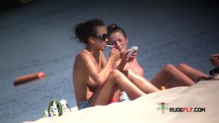 Voyeur at nude beach in spring time 3-9