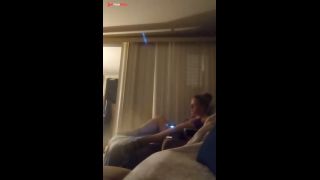 Nasty roommate masturbating to pretty busty girl in bra and panties while she is playing video games-1