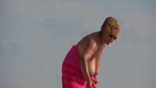 Gigantic mature tits on a beach Voyeur!-8