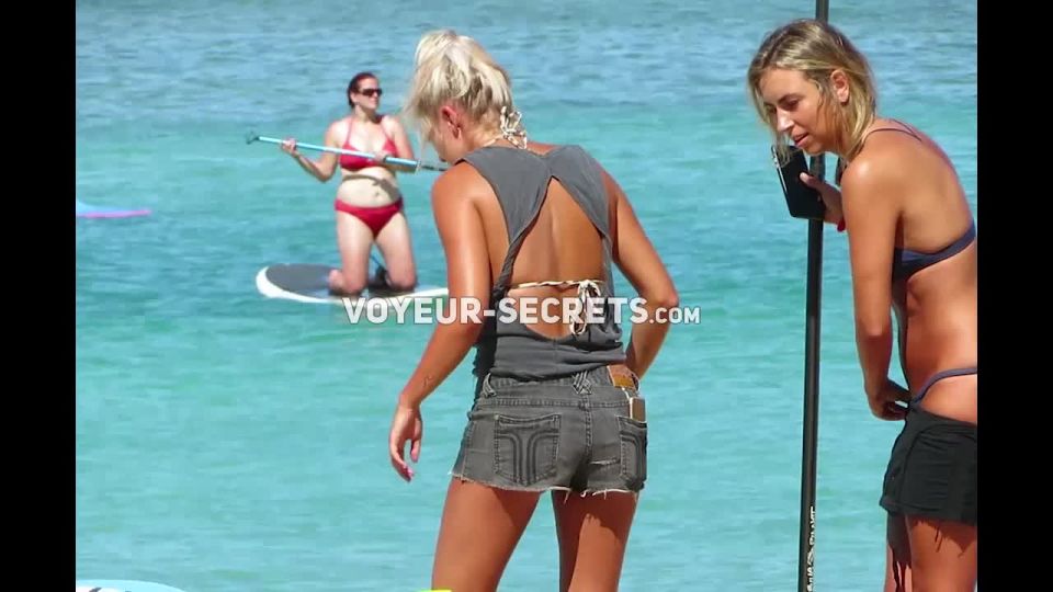 Hot beach girls paddle their surfboard Voyeur!