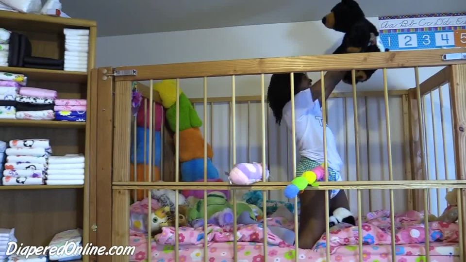 DiaperedonlineIris Iris Playing in Crib