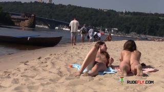 Long haired hottie shows her goods at the  beach-4