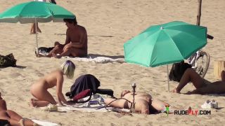 Youthfull naturist friends naked together at the  strand-2