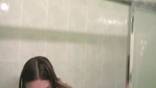 Natalie masturbates in the tub-0