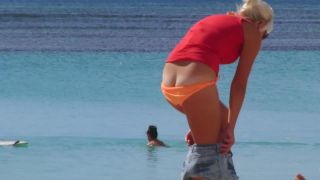 Milf's bikini malfunction on beach-0