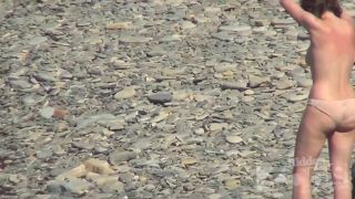  Voyeur nudism - Pretty woman with big 3174 is picking up water in the sea, voyeur on voyeur-1