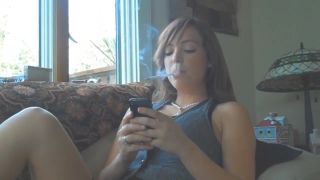 Movie title:Cute Brunette Smoking VS120s and texting - Smoking Babe.-2