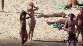 Long haired hottie shows her goods at the plage-7