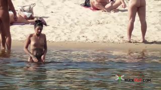 Long haired hottie shows her goods at the plage-8