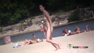 Beautiful fresh faced teen plays at the strand nude  3-2