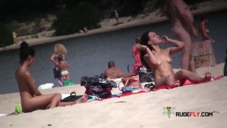 Beautiful fresh faced teen plays at the strand nude  3-7